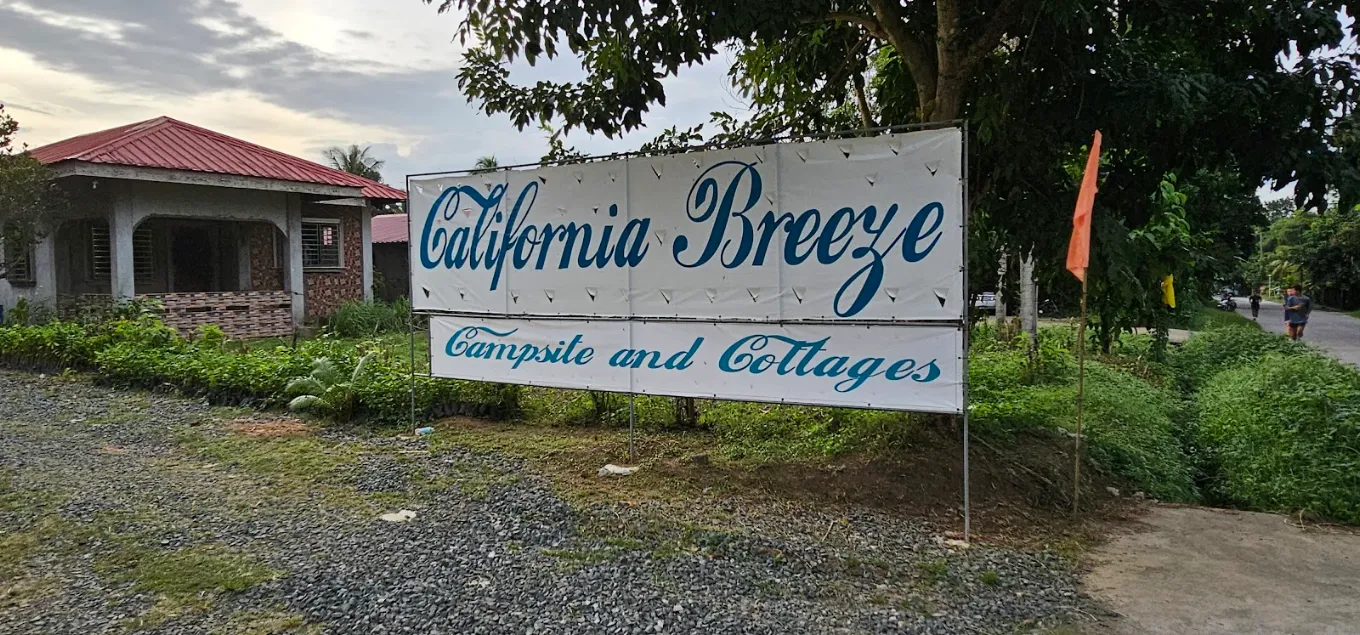 California Breeze Campsite sign with cottage and trees in Indang, Cavite.