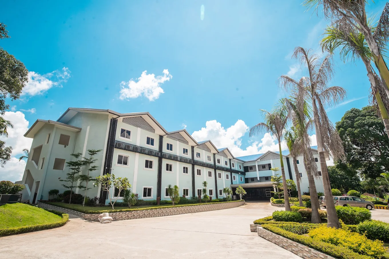 Star View Hotel and Resort Inc. in Silang with lush landscaping and a bright blue sky.
