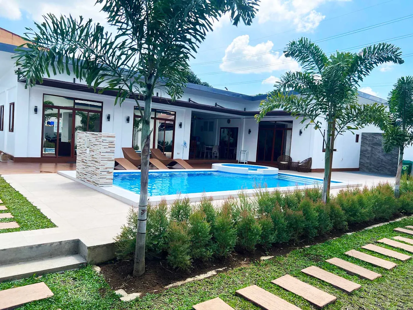 Modern villa with pool and garden at The Lawn Villa, General Trias.