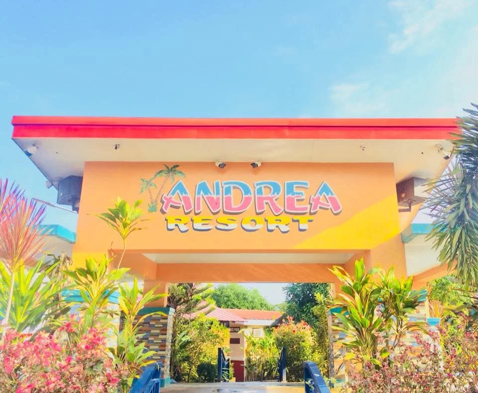 Andrea Resort entrance with colorful sign and lush greenery in General Trias, Cavite.