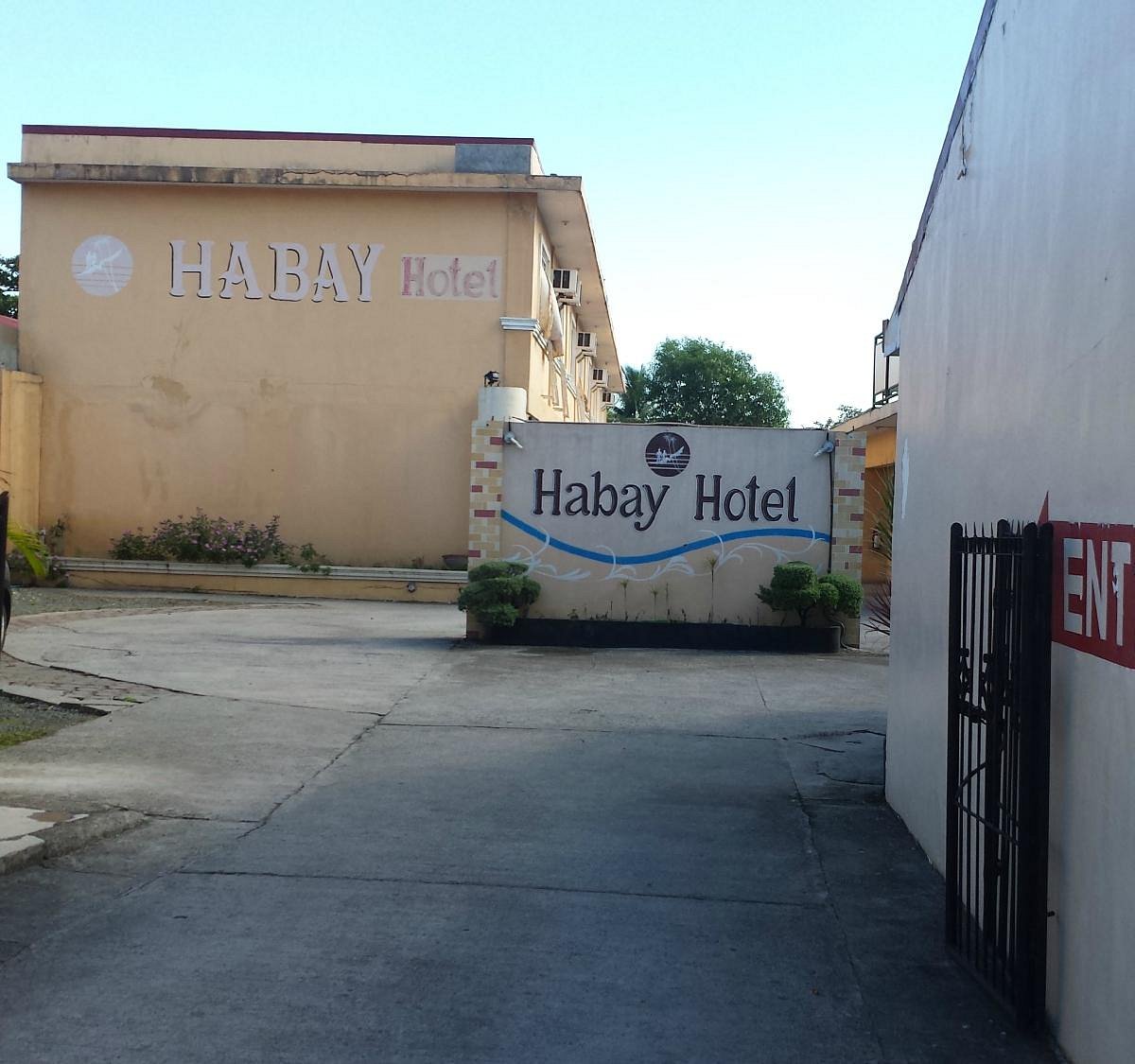 Habay Hotel and Pensionne House entrance with signage and building exterior in Bacoor, Cavite.