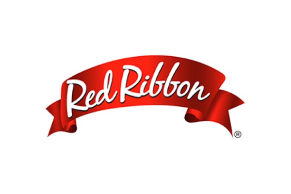 Red Ribbon Cavite City logo featuring a red ribbon design with white text.
